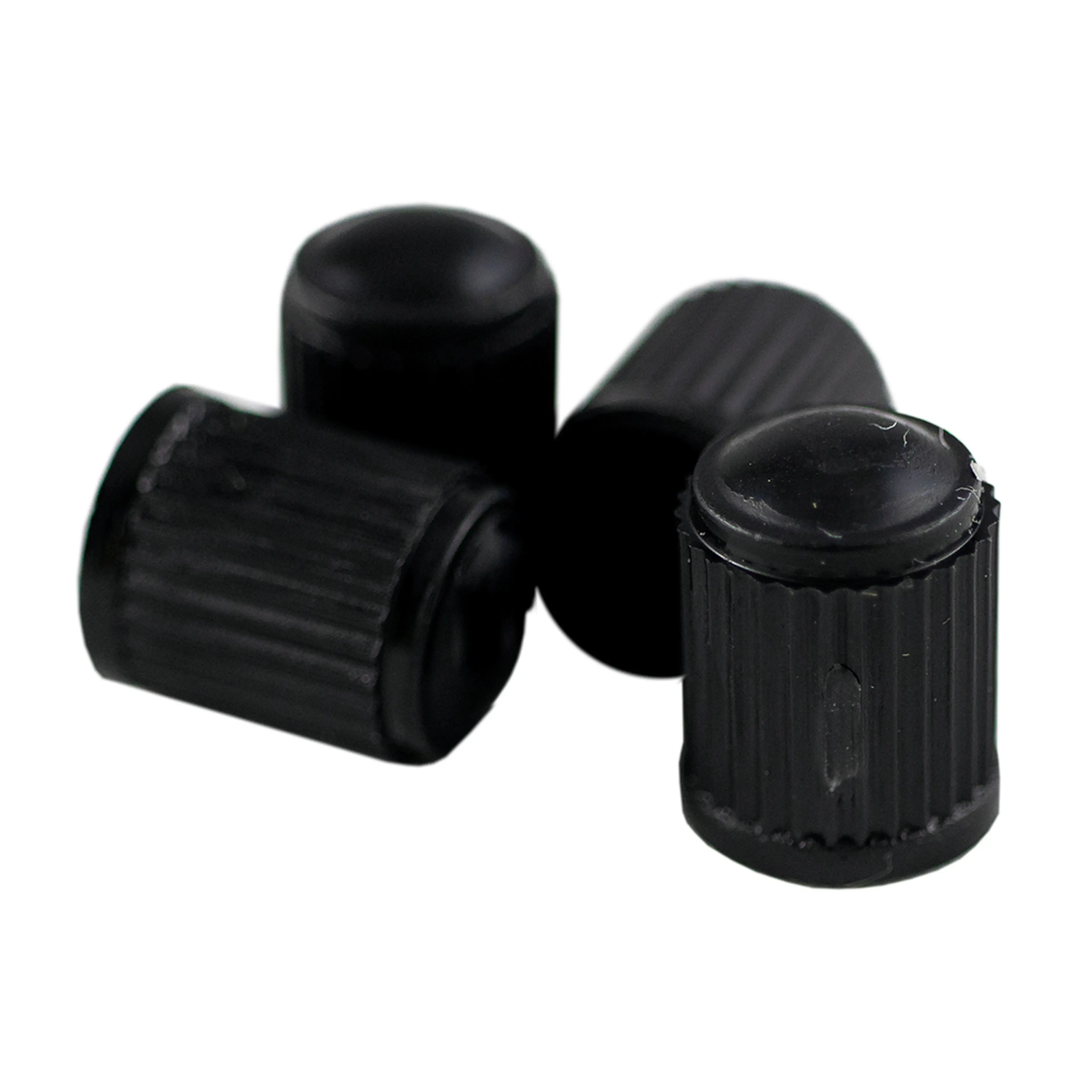 SET DE 4 TAPONES DE PLÁSTICO NEGROS