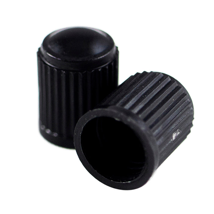 LOT DE 4 BOUCHONS EN PLASTIQUE NOIRS