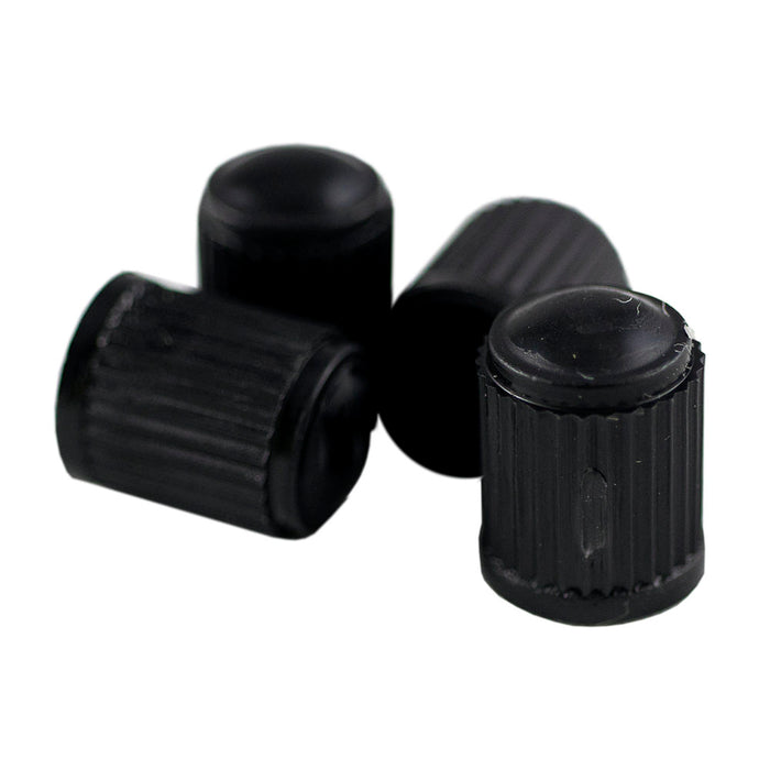 LOT DE 4 BOUCHONS EN PLASTIQUE NOIRS